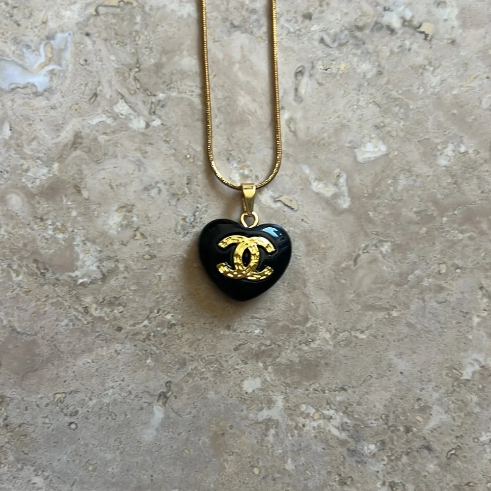 CHANEL Black Heart Pendant Necklace with Gold CC Emblem